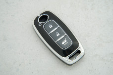 Чохол Nissan чорний хром поліуретан