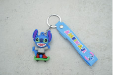 Брелок Стіч на зеленому самокаті з ремінцем 