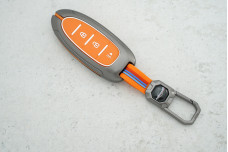 Чохол Nissan помаранчевий силікон + метал