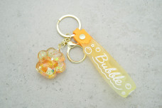 Брелок Лапка "Bubble" жовтий з ремінцем + карабін