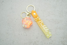 Брелок Лапка "Bubble" оранжевий з кульками з ремінцем + карабін