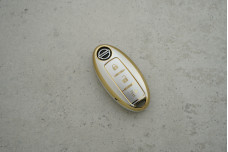 Чохол Nissan сірий-золото поліуретан