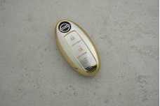 Чохол Nissan сірий-золото поліуретан на 2 кнопки