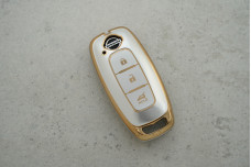 Чохол Nissan сірий-золото поліуретан