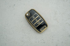 Чохол KIA чорний з золотом