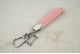 Брелок Mitsubishi плетений ремінець рожевий