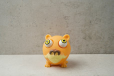 Іграшка Антистрес око рудий пес