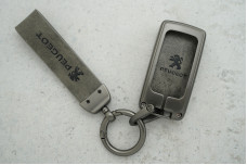 Чохол Peugeot сірий метал + шкіра