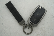 Чохол VW чорний шкіра + метал, універсальний