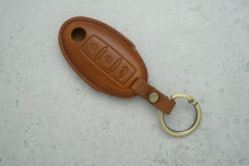 Чохол Nissan коричневий шкіра