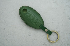 Чохол Nissan зелений шкіра