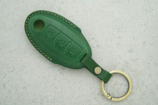 Чохол Nissan зелений шкіра