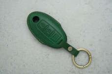 Чохол Nissan зелений шкіра