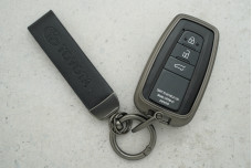 Чохол Toyota чорний сірий метал + шкіра, універсальний