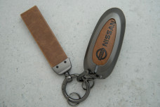 Чохол Nissan коричневий сірий метал шкіра, універсальний