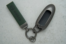 Чохол Nissan зелена шкіра + графіт метал