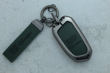 Чохол Cadillac зелений шкіра метал універсальний