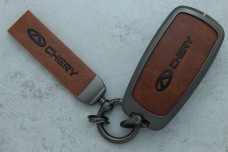 Чохол Chery сірий коричневий метал шкіра універсальний