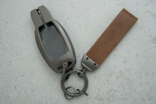 Чохол Mercedes коричневий сірий метал + шкіра універсальний