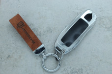 Чохол Porsche коричневий метал шкіра універсальний