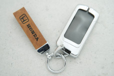 Чохол Honda коричневий шкіра + метал, універсальний