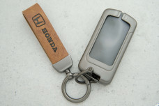 Чохол Honda коричневий сірий шкіра + метал, універсальний