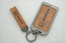 Чохол Honda коричневий сірий шкіра + метал, універсальний