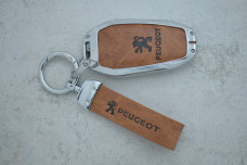 Чохол Peugeot коричневий метал шкіра універсальний