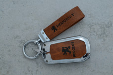 Чохол Peugeot коричневий метал шкіра універсальний