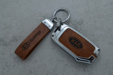 Чохол KIA коричневий метал шкіра універсальний
