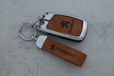 Чохол Peugeot коричневий метал шкіра універсальний