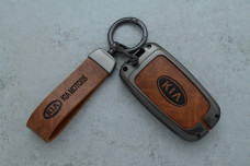 Чохол KIA сірий коричневий метал шкіра універсальний