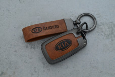 Чохол KIA сірий коричневий метал шкіра універсальний