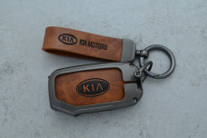 Чохол KIA сірий коричневий метал шкіра універсальний