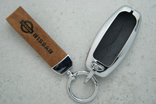 Чохол Nissan коричнева шкіра + метал універсальний