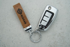 Чохол Nissan коричневий шкіра + метал, універсальний