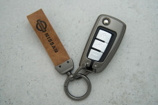 Чохол Nissan коричневий шкіра + метал, універсальний