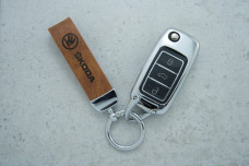 Чохол Skoda коричневий метал шкіра універсальний