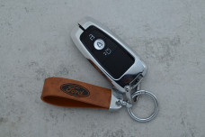 Чохол Ford коричневий метал шкіра універсальний