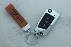 Чохол VW коричневий метал шкіра