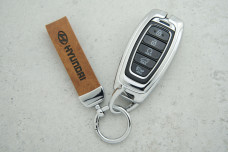 Чохол Hyundai коричнева шкіра + метал, універсальний