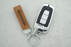 Чохол Hyundai коричнева шкіра + метал, універсальний