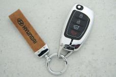 Чохол Hyundai коричневий шкіра + метал, універсальний