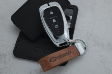 Чохол Chevrolet коричневий метал шкіра універсальний
