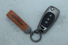 Чохол Chevrolet сірий коричневий метал шкіра універсальний