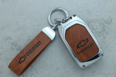 Чохол Сhevrolet  коричневий метал шкіра універсальний